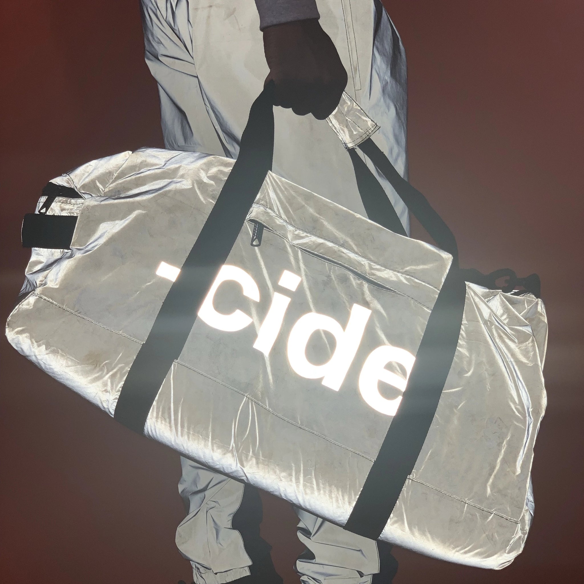 -cide Reflective Duffel Bags